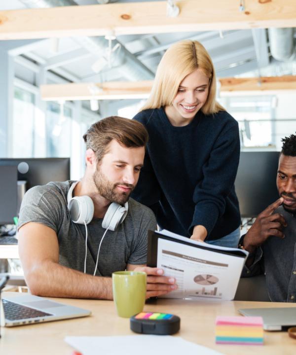Team working on a custom business website project
